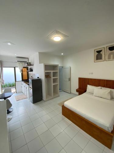 เตียงในห้องที่ Villa Eden