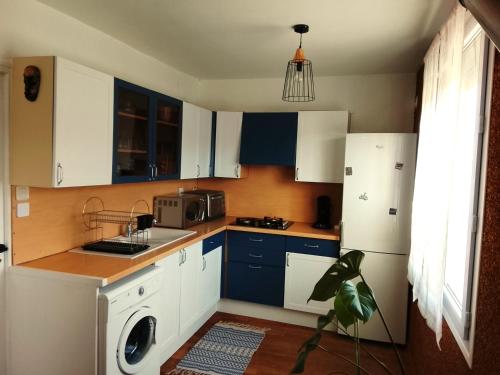 Køkken eller tekøkken på Grand Duplex, proche de la Dordogne