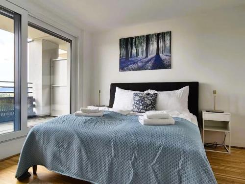 En eller flere senge i et værelse på Parkapartment mit Grünblick nahe Zentrum