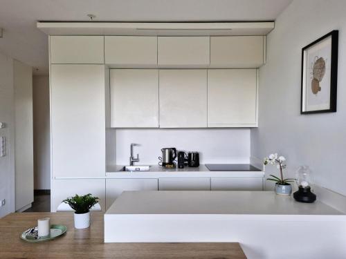 En eller flere senge i et værelse på Parkapartment mit Grünblick nahe Zentrum