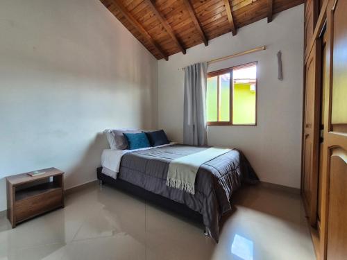 Postel nebo postele na pokoji v ubytování Apartamento céntrico en Guatapé - 2 habitaciones - 2 baños