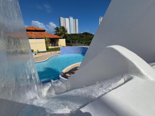 a water slide in a water park at Sea Breeze Villa in Fajardo