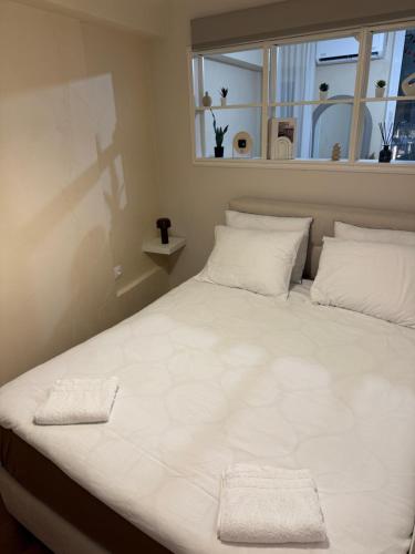 Кровать или кровати в номере BK Urban Living