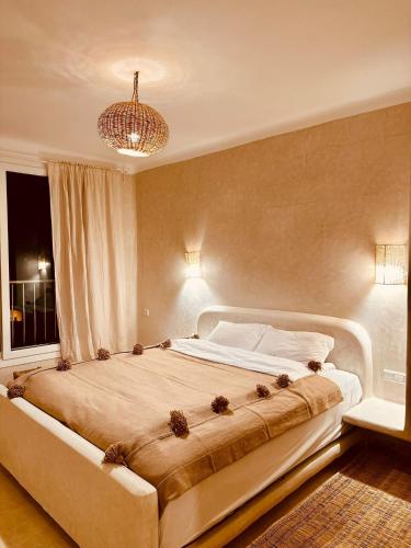 Ένα ή περισσότερα κρεβάτια σε δωμάτιο στο Amazigh Home