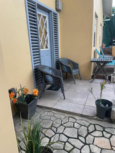 Pati o zona exterior de Tropical Harbour View