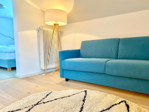 Posezení v ubytování Feine FeWo im DG am Tegernsee