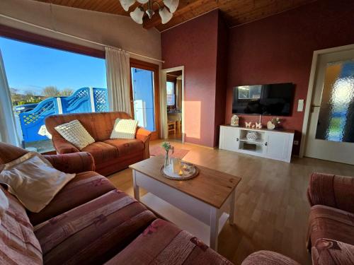 Et tv og/eller underholdning på Ferienhaus Küstenzauber Simonsberg Nordsee Meer Husum