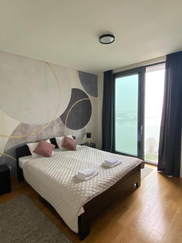 Una cama o camas en una habitación de BW Residences - Belgrade Waterfront