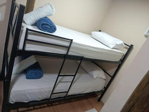 Ένα ή περισσότερα κρεβάτια σε δωμάτιο στο Canoa Abraão - Ilha Grande RJ