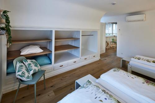 Giường trong phòng chung tại Vakantiehuis Elisa