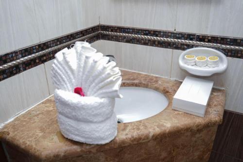 صورة لـ فندق الرسالة الذهبي شارع المنصور توصيل مجاني للحرمGolden Message Hotel, Mansour Street في Az Zahrāʼ