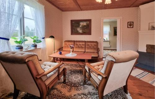 Posezení v ubytování 3 Bedroom Amazing Home In Broaryd