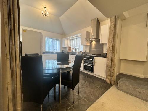 Kuchyň nebo kuchyňský kout v ubytování Lovely Calm Independent Home