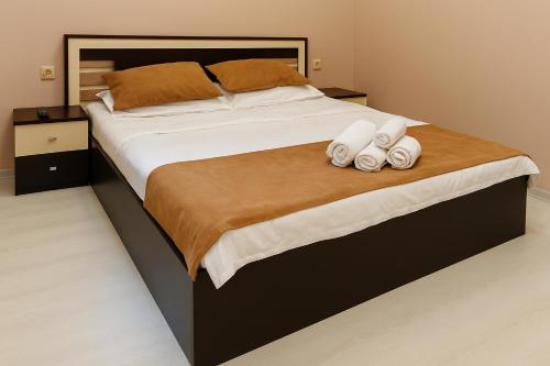 Postel nebo postele na pokoji v ubytování Old Batumi Stay