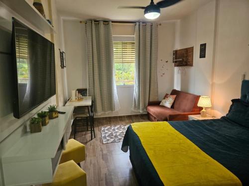 Et tv og/eller underholdning på BELO flat Cavalinho Branco-Aguas de Lindóia