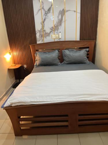 Postel nebo postele na pokoji v ubytování Residence Ngouandjo