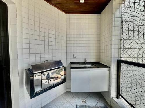 Ảnh trong thư viện ảnh của Apartamento Pitangueiras 3 dorm Churrasqueira Gourmet ở Guarujá