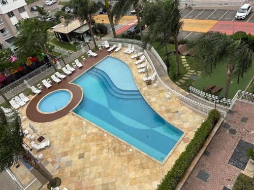 Swimmingpoolen hos eller tæt på Apartamento em Curitiba