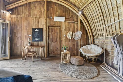 Posezení v ubytování Noon Bamboo Villas Pererenan