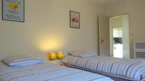 Llit o llits en una habitació de My Apartment-Metz