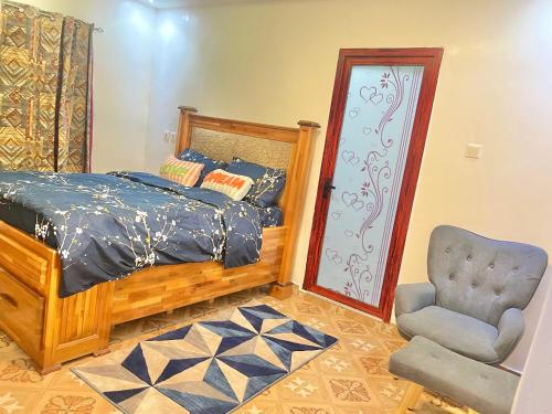 Ένα ή περισσότερα κρεβάτια σε δωμάτιο στο Flozicare Royal 3-Bedroom House in Accra