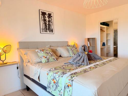 En eller flere senge i et værelse på Tahiti Moana Vista