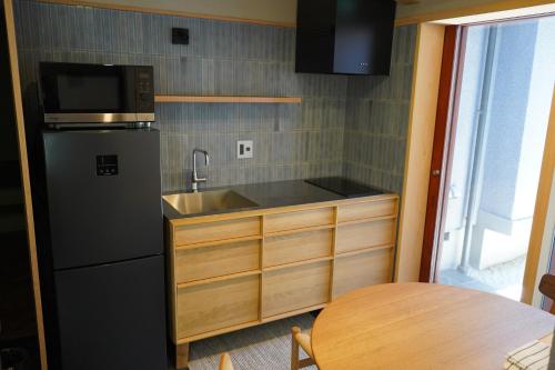 Kuchyň nebo kuchyňský kout v ubytování 岸之坊 Kishinobo Temple inn