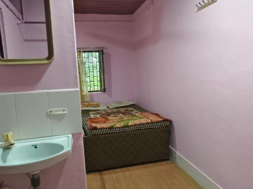 Et badeværelse på Vishranti Homestay, Ladghar