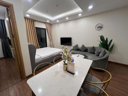 Μια τηλεόραση ή/και κέντρο ψυχαγωγίας στο QUY NHƠN - FLC Sea Tower - Codotel View Biển - Hồ Bơi 4 Mùa-Sea View Hotel