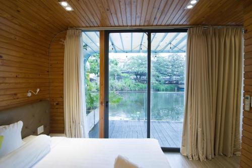 En eller flere senge i et værelse på Bungalow 1 phòng ngủ View Hồ Melly - Vũng Tàu