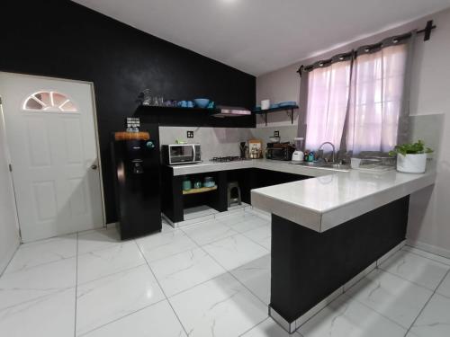 Kuchyň nebo kuchyňský kout v ubytování Casas centro Loreto