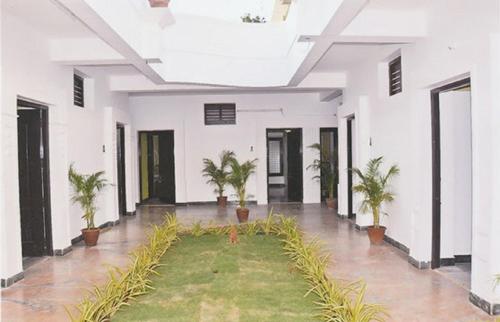 The lobby or reception area at Arunaalaya Residency