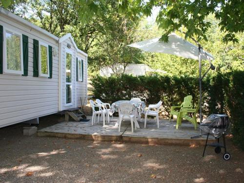 Mobil-home avec terrasse au camping de Payrac - API-1-52-1220