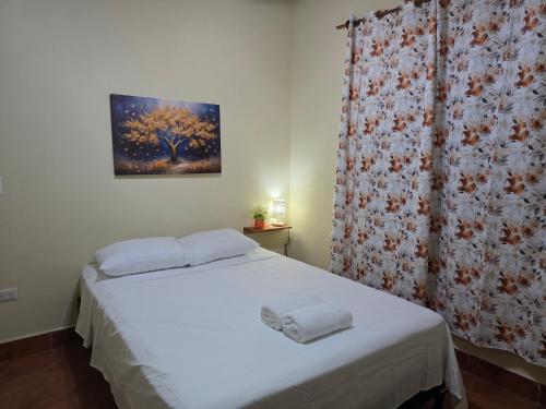 Rúm í herbergi á Hotel Casona Macondo, Granada, Nicaragua