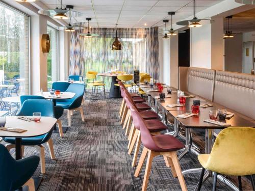 Hôtel Novotel Valenciennesにあるシーティングエリア