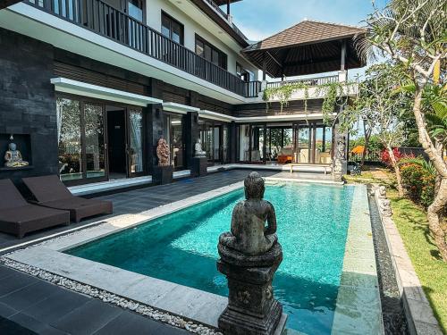 Swimmingpoolen hos eller tæt på Puri Sharai Homestay