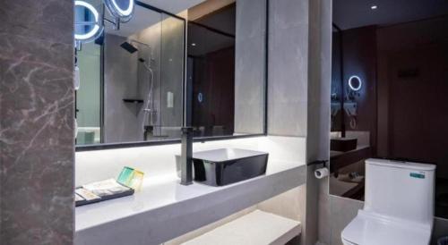 Un baño de IU Hotels·Nanning Zoo Metro Station RT-Mart