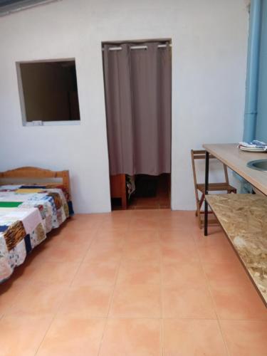 En eller flere senge i et værelse på Petit nid au calme