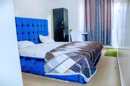 Postel nebo postele na pokoji v ubytování Empire Motel