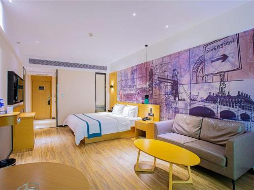 Ένα ή περισσότερα κρεβάτια σε δωμάτιο στο City Comfort Inn Guilin City Hall