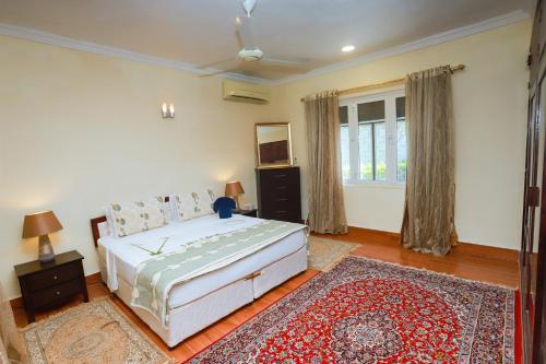 Postel nebo postele na pokoji v ubytování Beit El Raas Villa