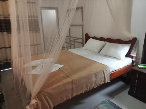 Ένα ή περισσότερα κρεβάτια σε δωμάτιο στο Waruna Relax Homestay
