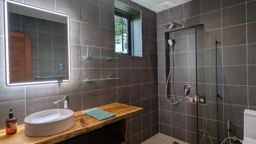 Et badeværelse på Titine Apartment