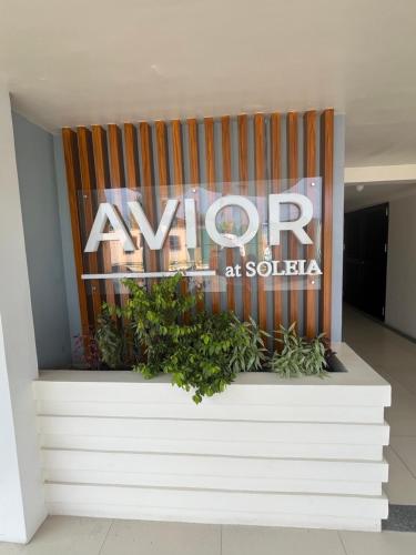 Et logo, certifikat, skilt eller en pris der bliver vist frem på Soleia