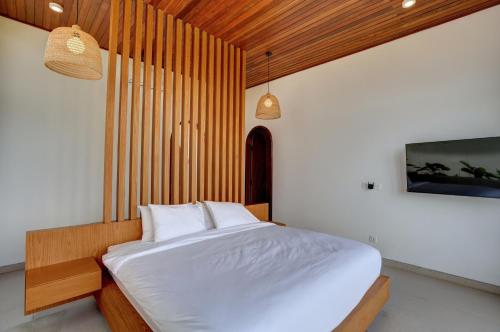 Postel nebo postele na pokoji v ubytování AB Villa Nyanyi