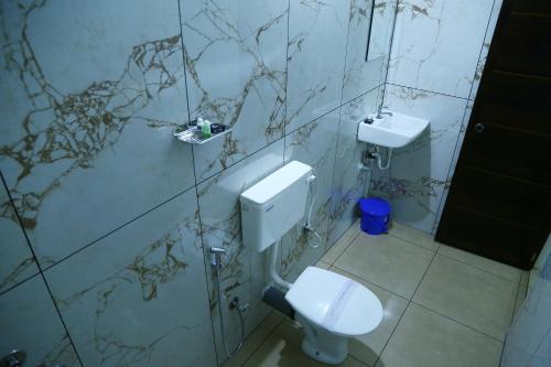 Koupelna v ubytování Oxxon Airport Hotel