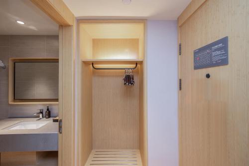 Ένα μπάνιο στο JI Hotel Nanjing Ming Palace