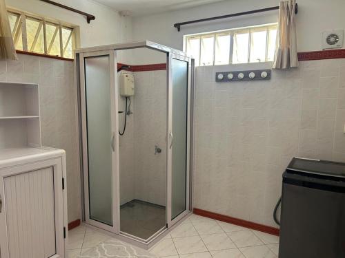 Ванная комната в Sun Palm Villa - Blue Bay