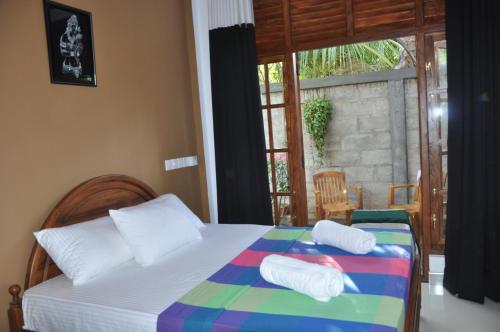 Postel nebo postele na pokoji v ubytování Summerland Residence