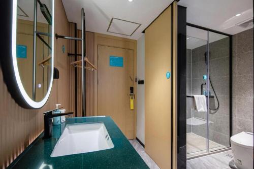 Un baño de City Comfort Inn Nanning Normal University Mingxiu Metro Station